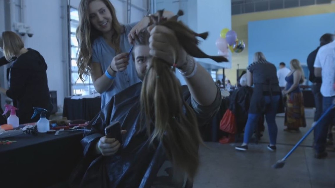 Community of men grow out hair for a good cause [Video]