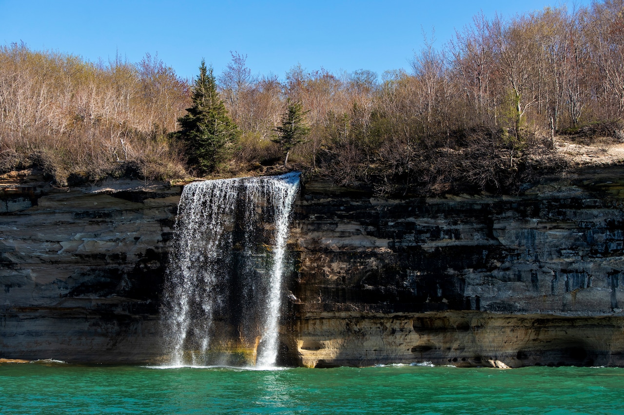 Pictured Rocks waterfall puts on rare summertime show [Video]
