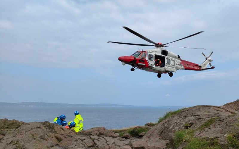 Injured man rescued by helicopter from popular Co Antrim tourist site in “delicate operation” [Video]