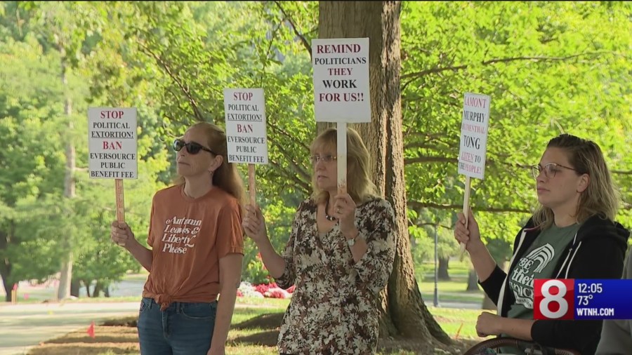 Residents rally against high utility rates outside Capitol [Video]