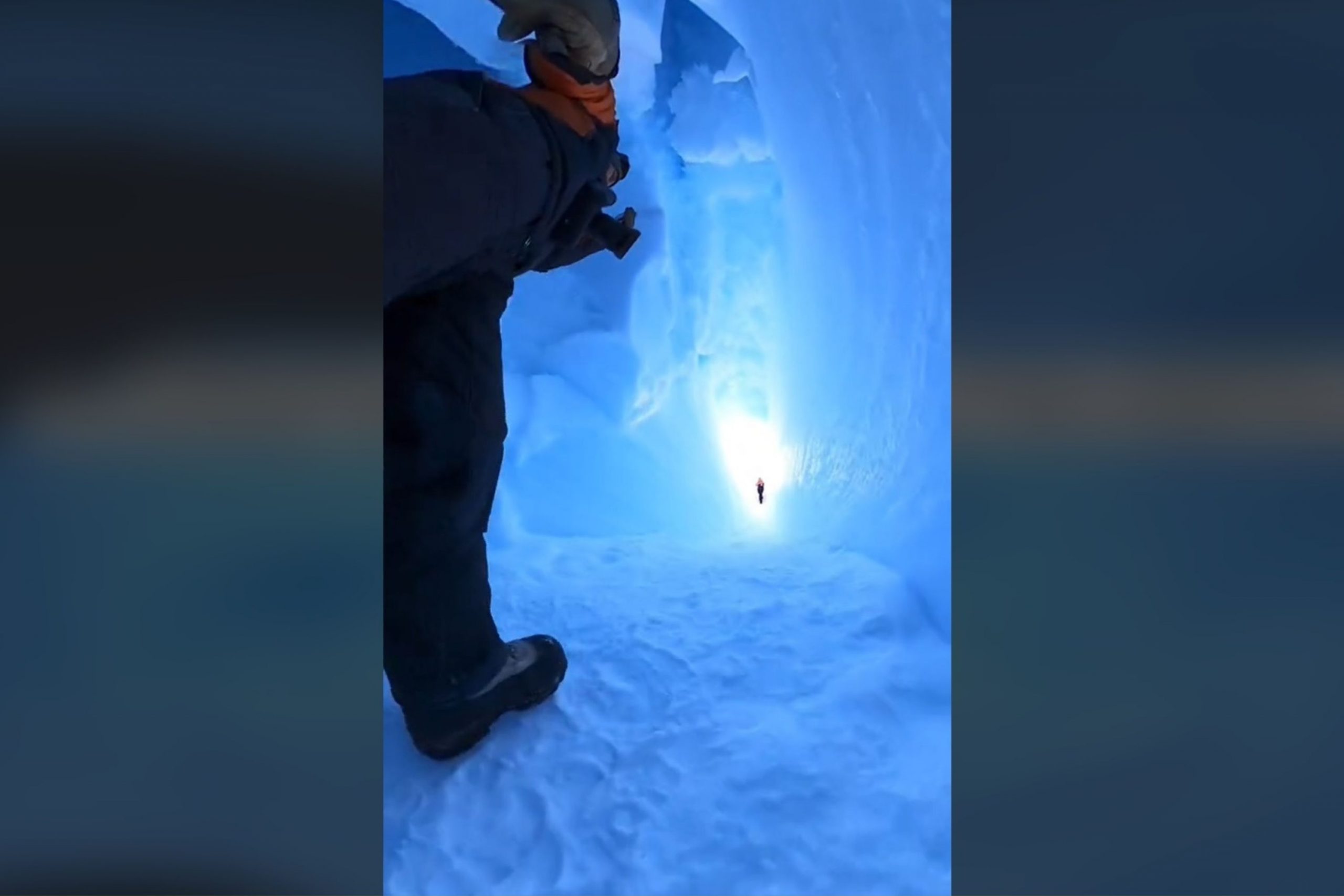 Man’s ‘Unbelievable’ View Walking Through Antarctic Ice Cave Stuns Internet [Video]