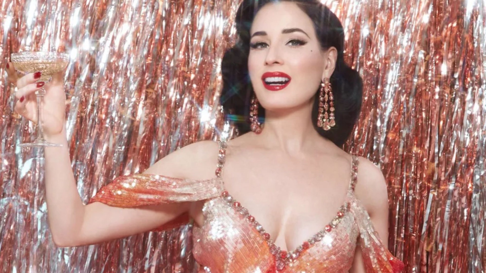 Dita Von Teese, 52, shows off her curves in sequin gown as she raises a glass to promote Las Vegas residency [Video]